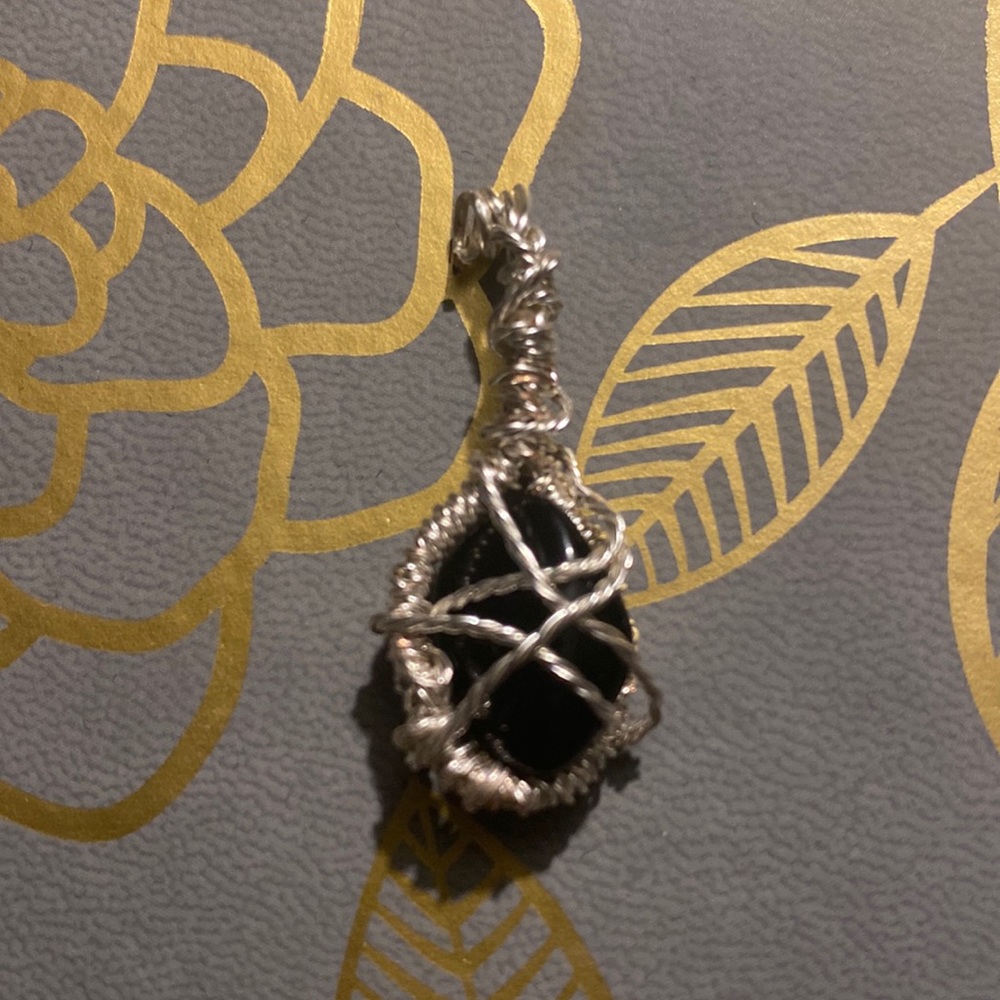 Women’s wire wrapped crystal pendant